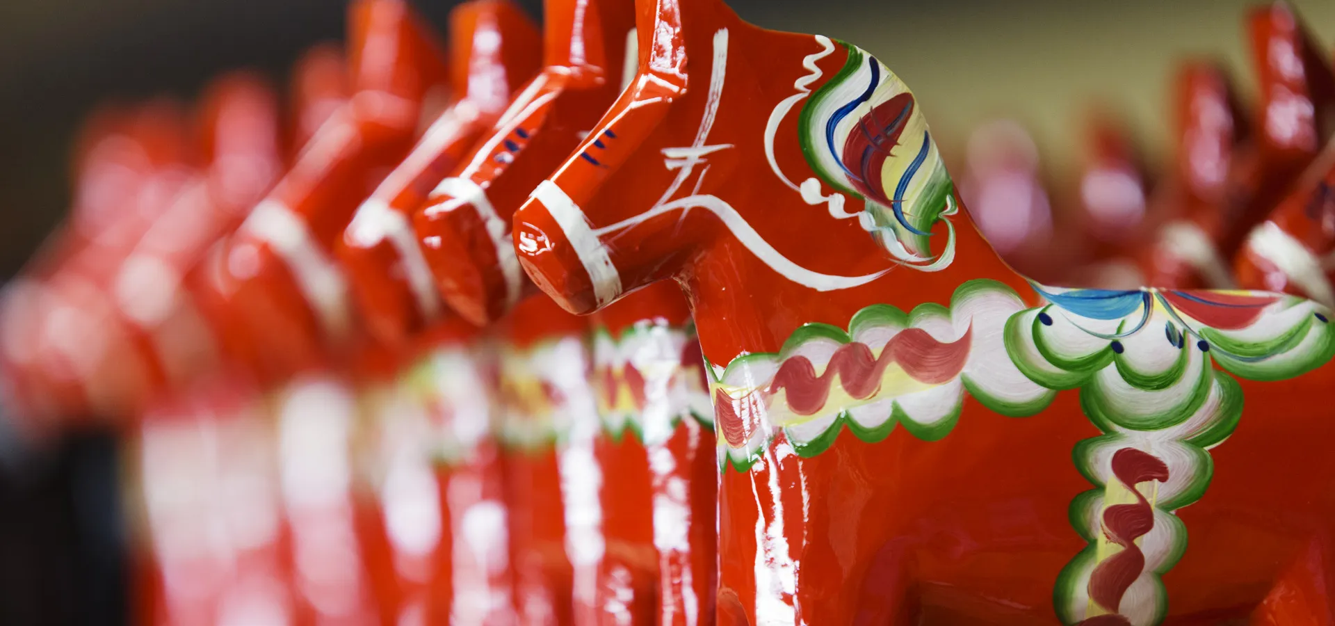 Dala horses in a row.