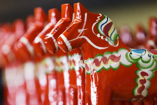 Dala horses in a row.
