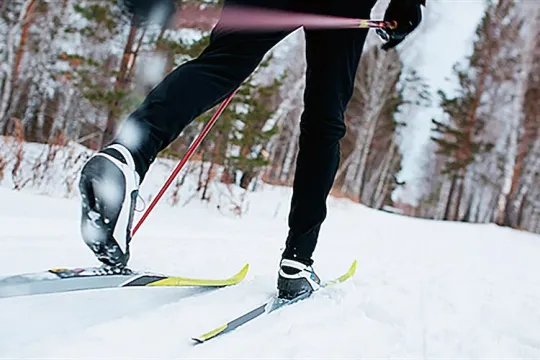 A person skiing in the snow.