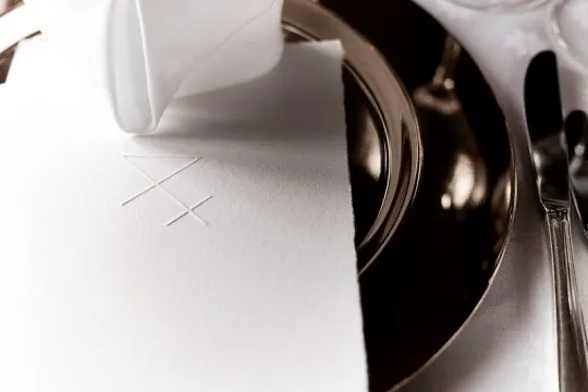 Plate on the table with a menu.