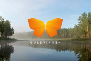 Logotyp för priset Guldvingen, som delas ut till företag i Dalarnas Besöksnäring.
