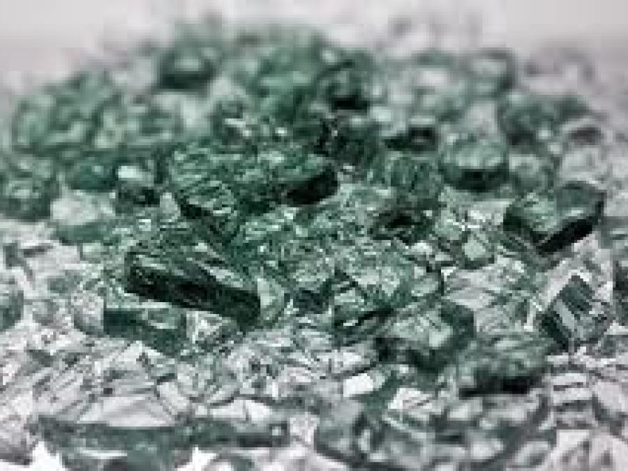 A green-gray pile with small pieces of glass.