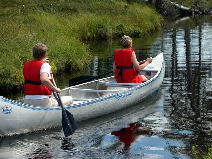 Two persons in a canoe