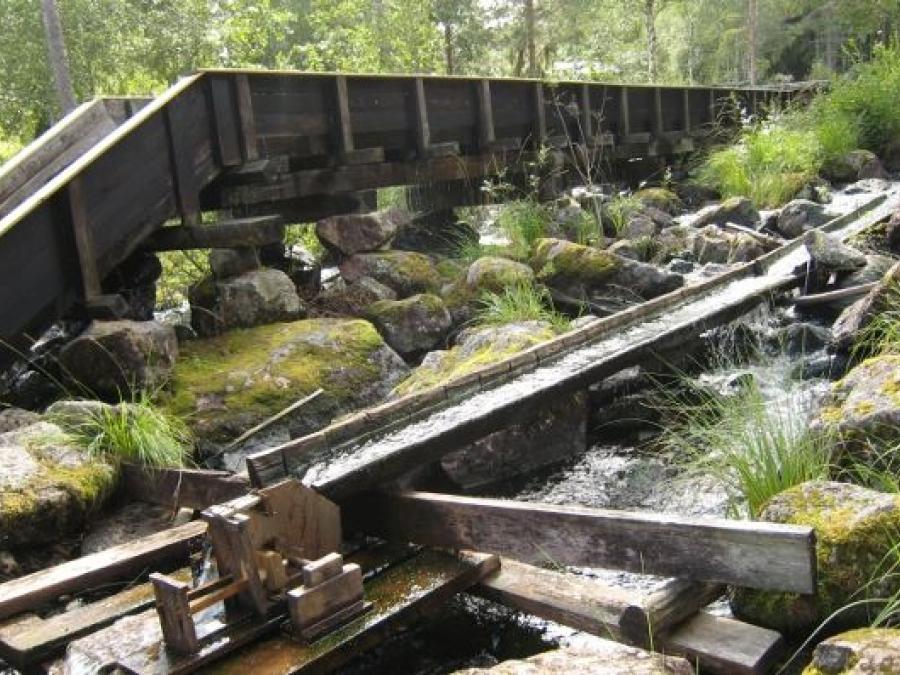 Wooden canals that transport water.