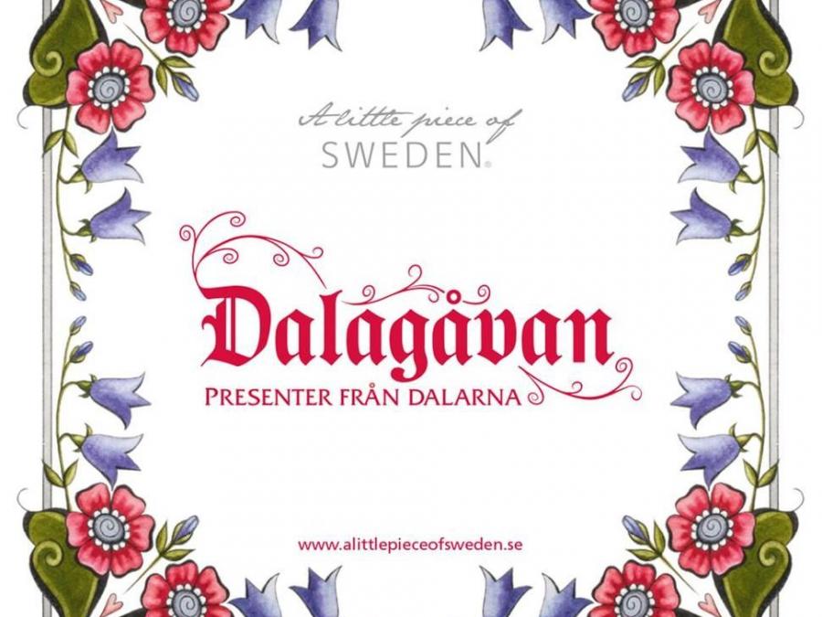 Box with bluebells and red flowers with text Dalagåvan.