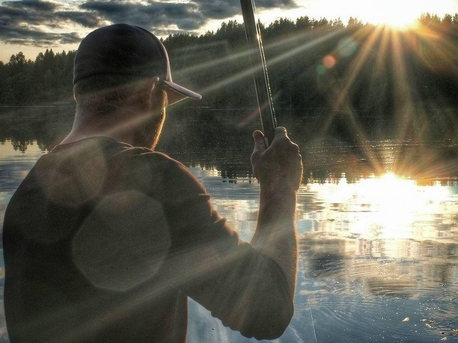 Gay fishing by the lake. 