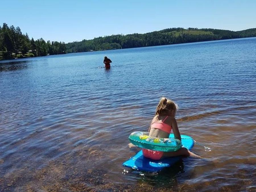  Girl bathing in the lake.