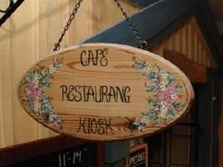 A sign with the resturants name.