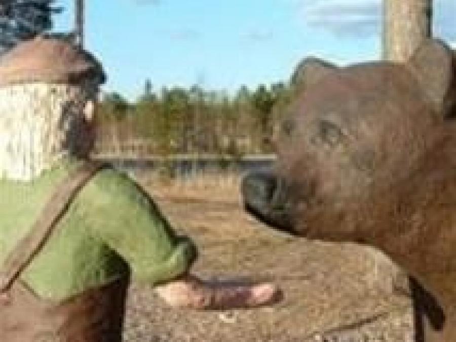 Staty med Olle och björnen. 