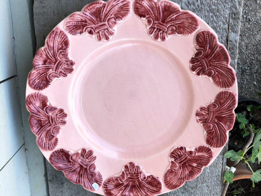A pink ceramic pkate.