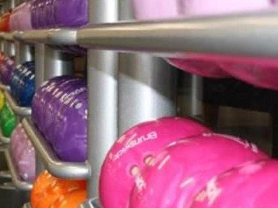 Bowling balls in a row.