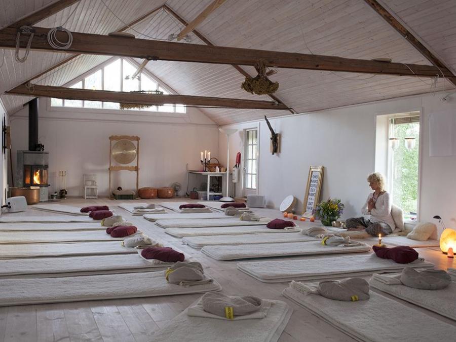 A hall with yoga mats.