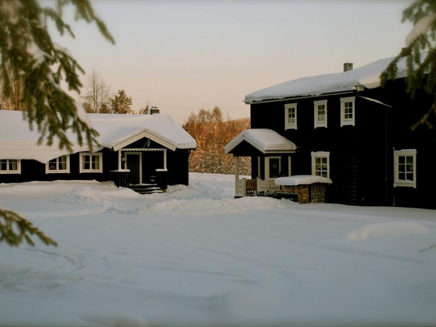 Exterior of the house in snow at winter. 