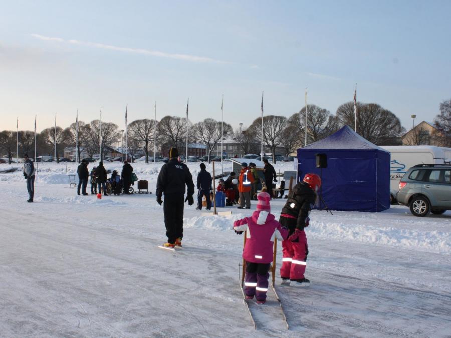 Children skating on the ice.