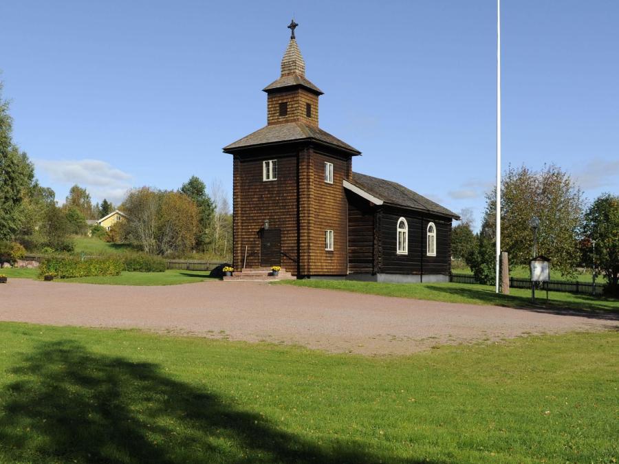 Small brown chapel.