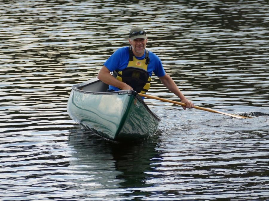 A man in a canoe.