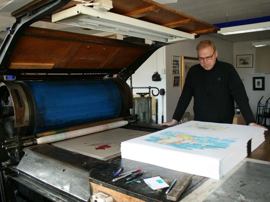 Man working with  lithography