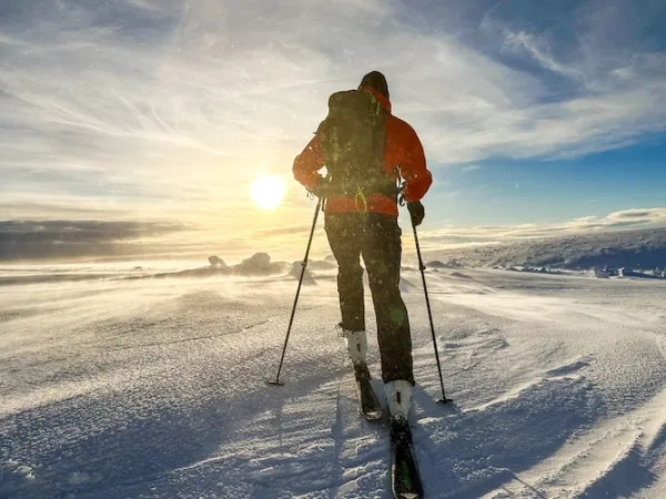 Skier on the top of a mountain. 