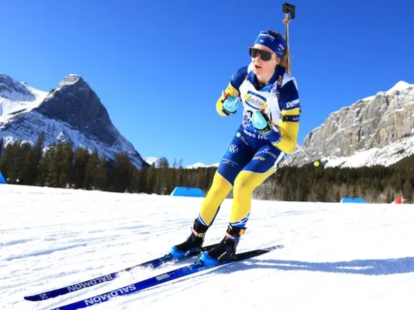 Mona Brorsson skiing in international team uniform