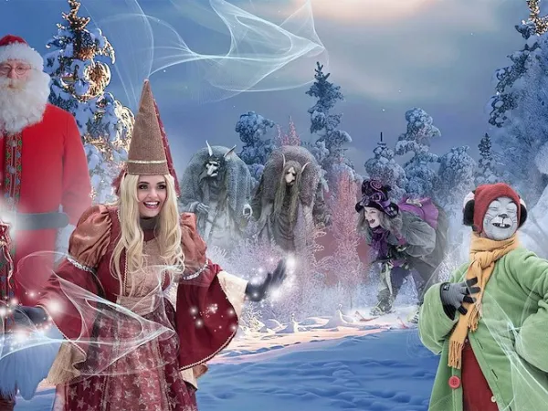 Santa and Fairytale characters in the forest in the winter night.