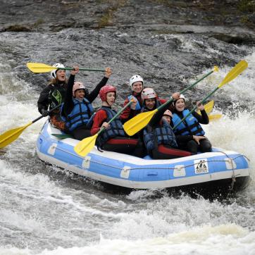 Rafting in a river.