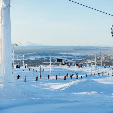 A nice winter day at a ski resort.