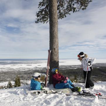 A family in the ski slopes.