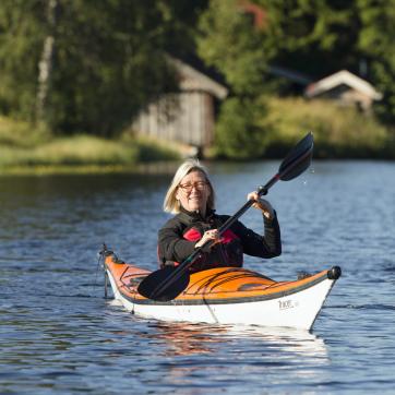 A woman on a kayak.