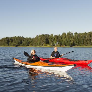 Two people doing kayak.