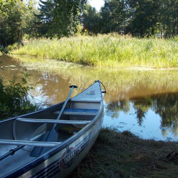 Canoe by a river in Avesta.