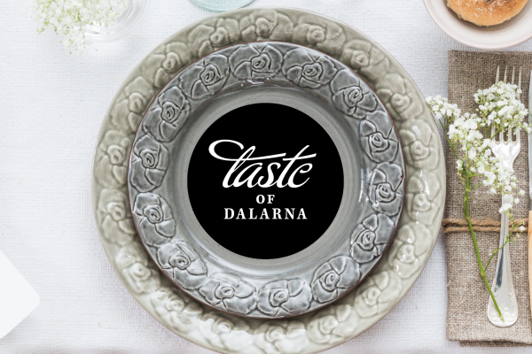 Taste of Dalarna logo on a plate.