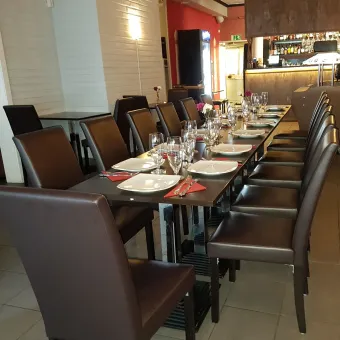 Layed table welcoming a company of guests.