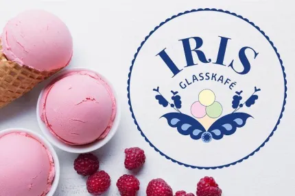 Rosa glasskulor och några hallon. 