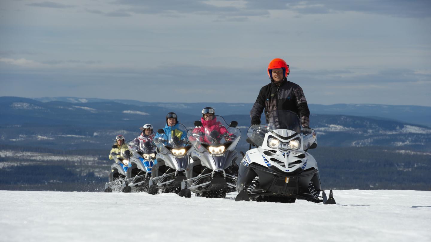 A group of snowmobile riders in Sälenfjällen.